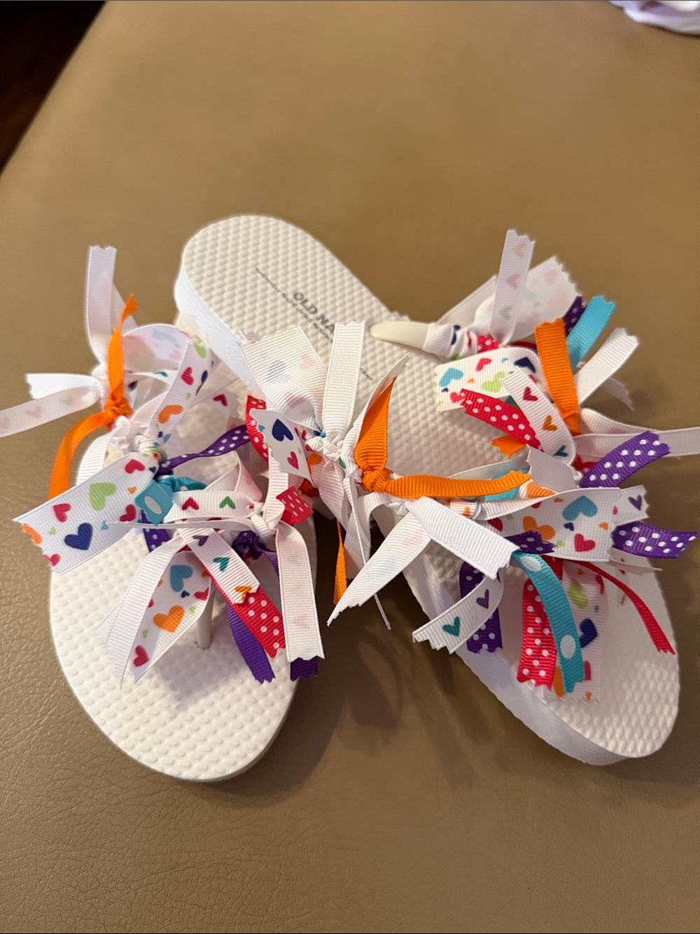 Old Navy White Flip Flops with Multi-Color Ribbon Hearts